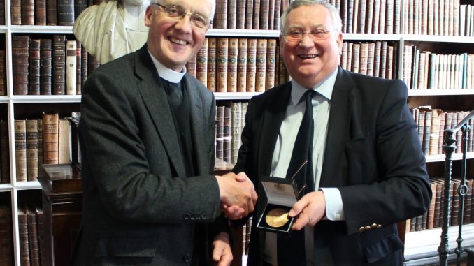 johnrainey 021 Donation of Memorial Medal to the Library