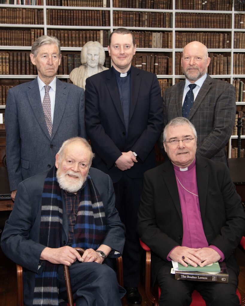 Seated before his talk is poet Michael Longley along with Archbishop John McDowell, the Chairman of the Library's Governors and Guardians. Standing from left were Mr Bill Montgomery, a member of the Library's Development Advisory Committee, the Very Revd Shane Forster, the Library's Keeper and Mr Brian Acheson, Chairperson of the Development Advisory Committee